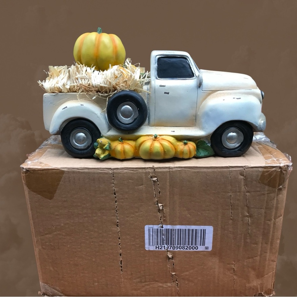 Plow & Hearth in orig.box vintage truck full of pumpkins. Great fall display.